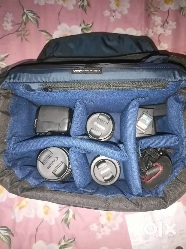 less driven camera conon 200D with 3 lans or 2 chager and 2 memory