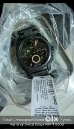 Fossil chronograph brand new with you 2 years  warrenty metal strap..