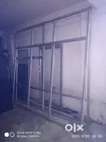 Aluminium glass frame partition with door in shop,etc.