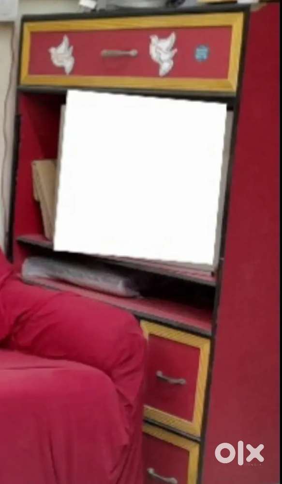 “TV cupboard in good condition with 5 storage drawers.”