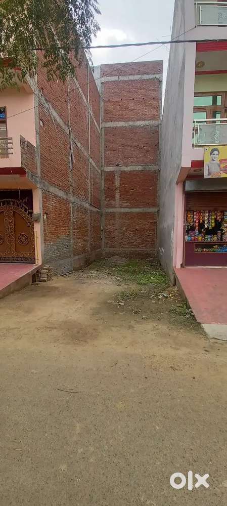 60 Gaj Plot infront of 60 Ft Road surrounded by house from three sides