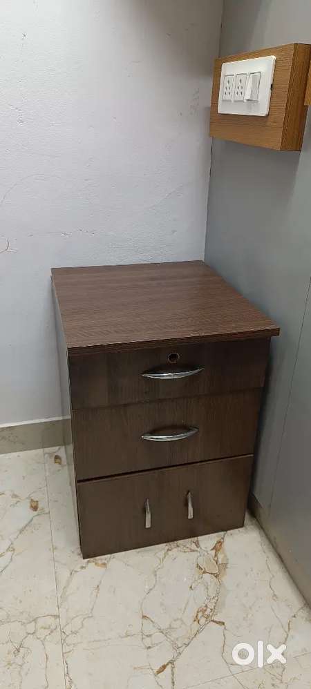 Bed side table with drawers