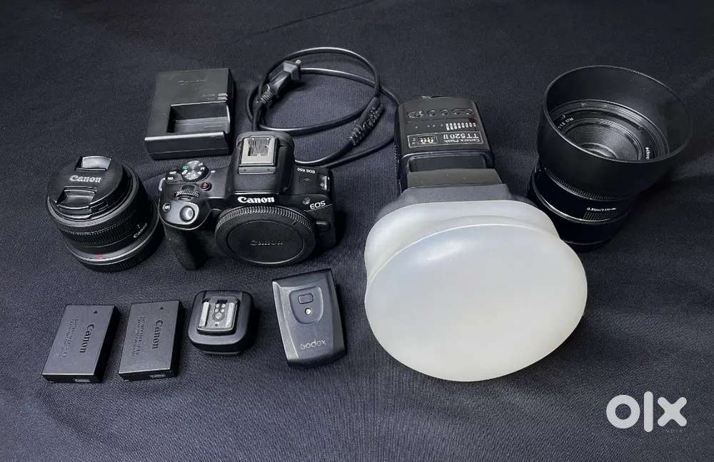 Canon r50 with kit lens and 50 mm 1.8 lens falsh and adopter