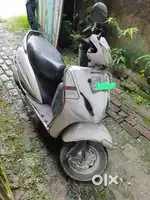 Honda Activa white colour with helmet