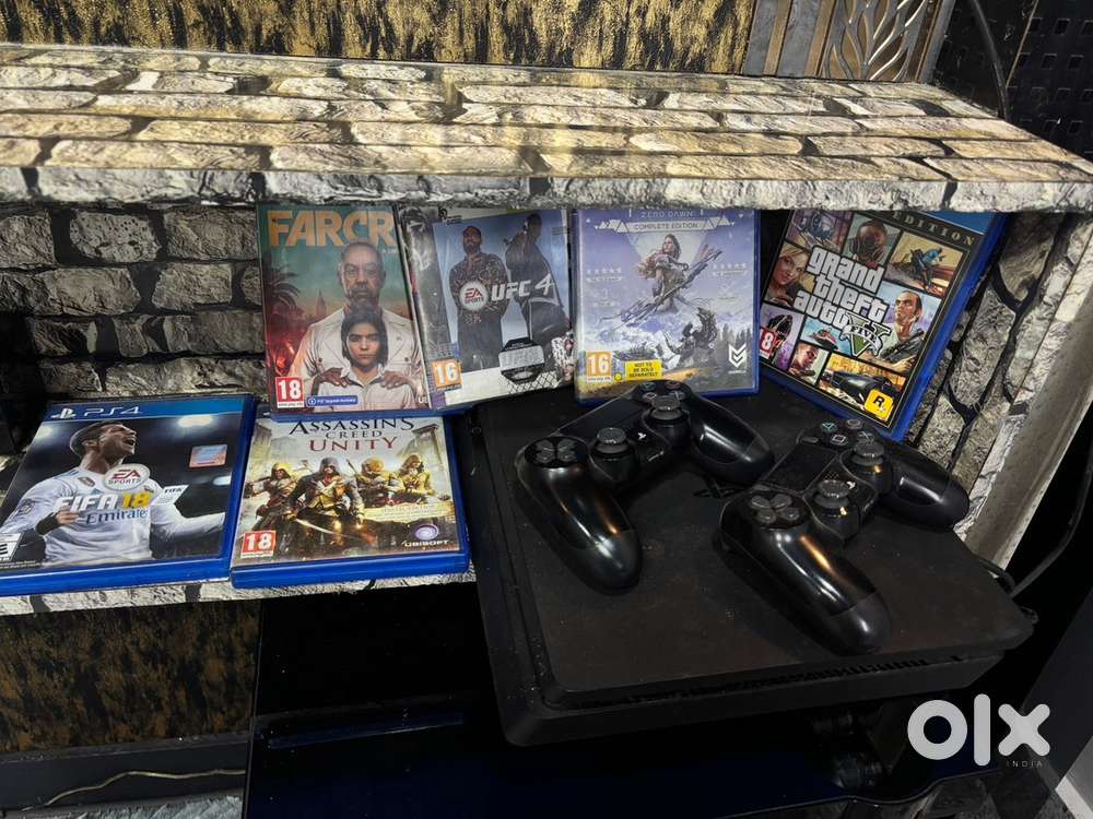 Playstation 4 , with 2 controllers and games