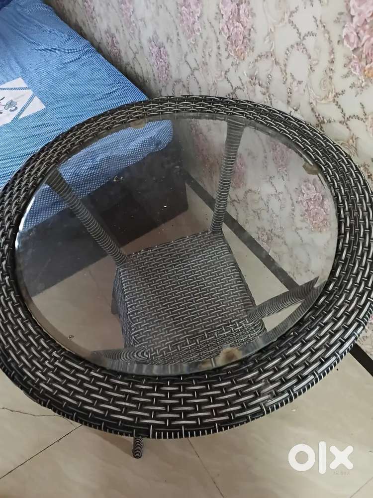 One round table with four chairs