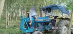 Ford New Holland 3630 with Pressure Dumper