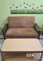 Two seater sofa and table