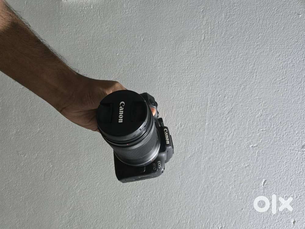 Canon R10 with 18-150 mm,EF adapter , extra battery, canon flash