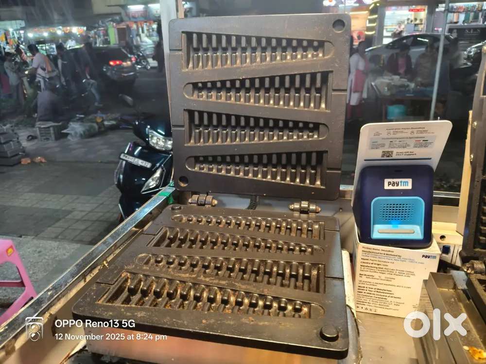 Chocolate waffle machine and counter in excellent condition.