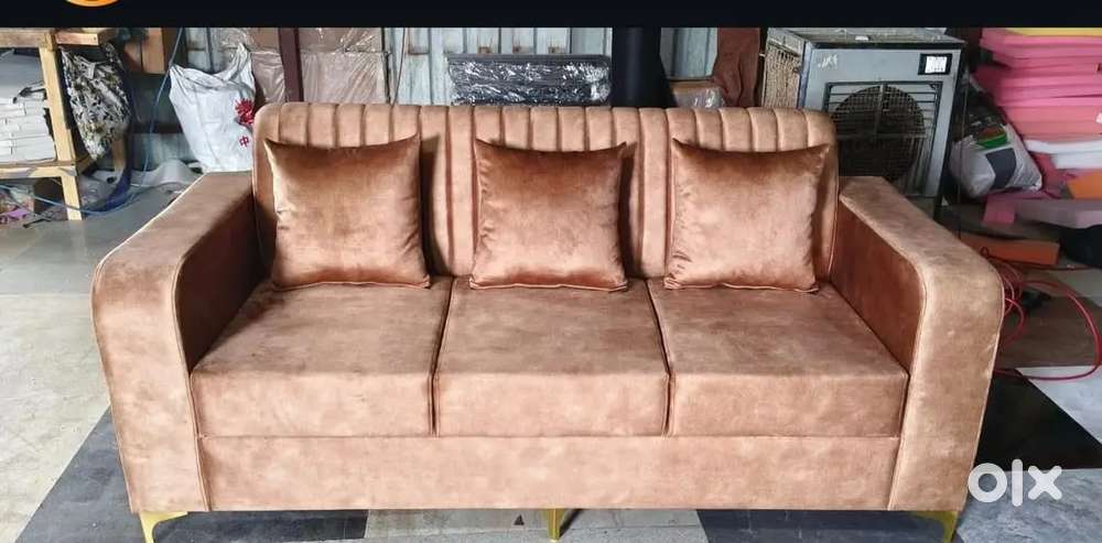3 seater sofa with beautiful colour and pillows with stripes model
