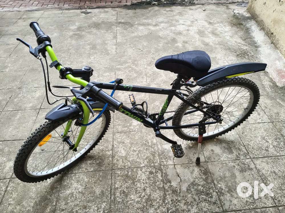 Rockrider 300 Geared Mountain bike 24 inch for 8-12 years