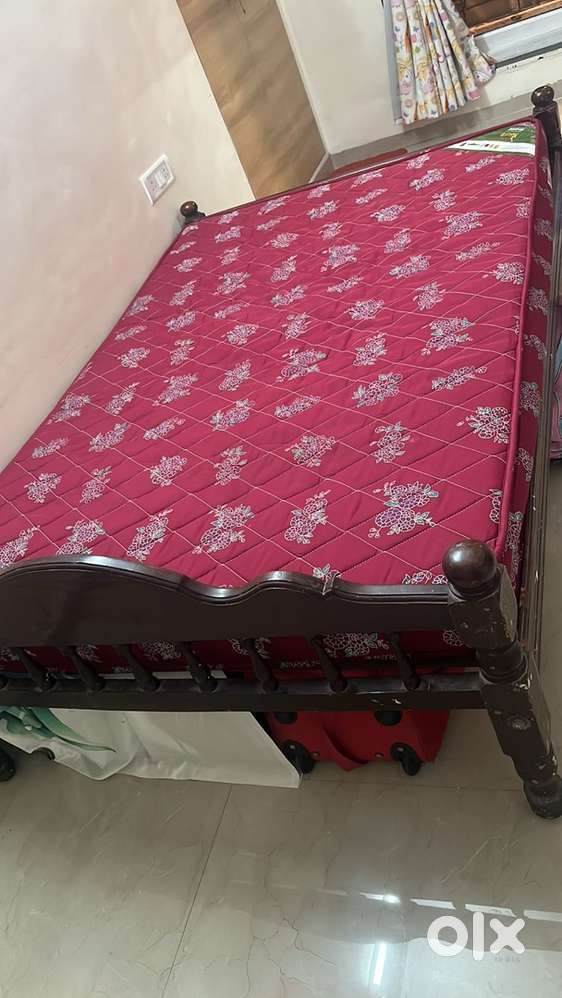 Bed with mattresses