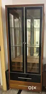 Premium glass crockery cabinet with mirror and light inside