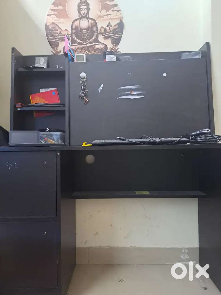 Wooden Study table  for sale. Which is 2 Years old in good condition .