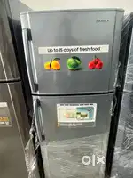 Samsung double door fridge good condition with warranty 1 year old