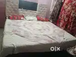 Wooden double bed