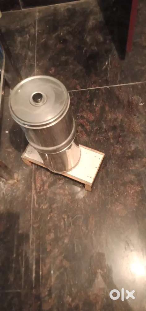 स्टील का चीनी मिट्टी की रोड वाला पीने के पानी को फिल्टर करने वाला ।