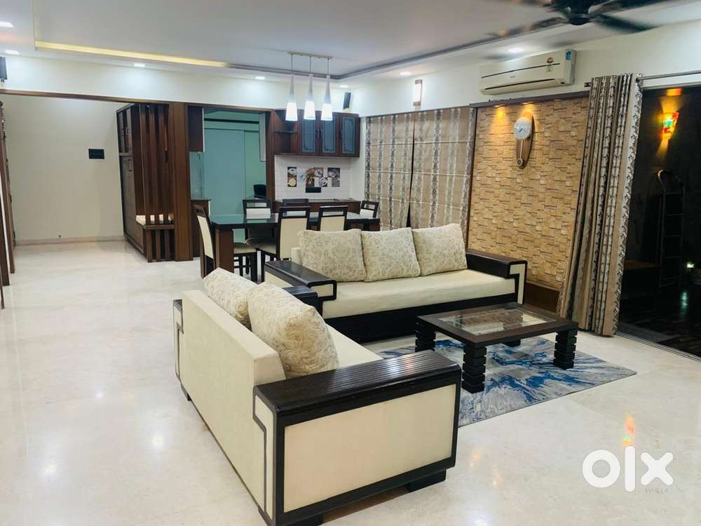 5 seater Teak wood fabric sofa with Glass center table