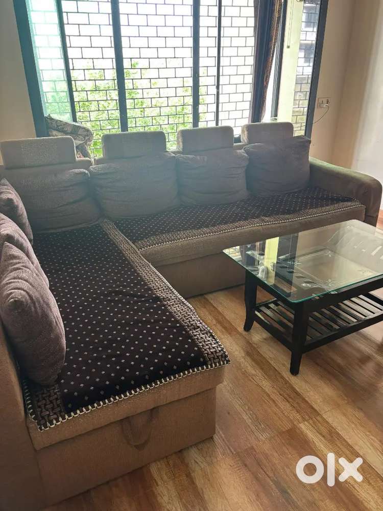LShape Sofa cum bed with side table and Dinning table