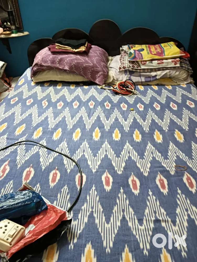 One segun wooden double bed without box