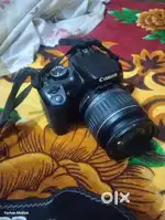 Canon Rebel XTi DSLR Camera with EF-S 18-55mm f/3.5-

5.6 Lens