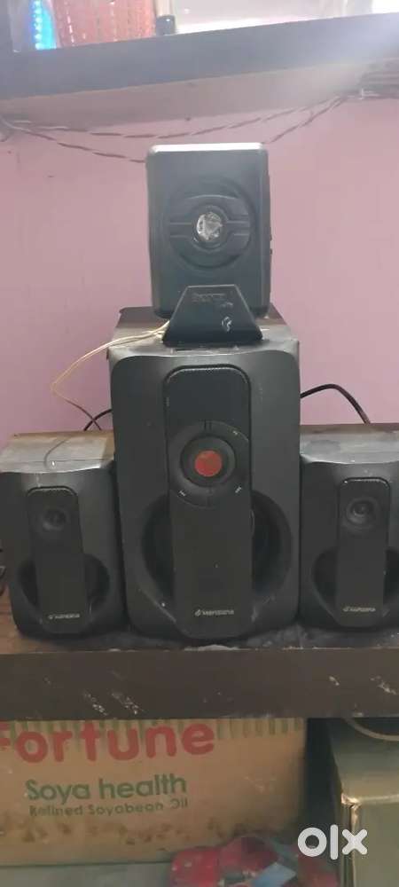 Home theatre with extra speaker