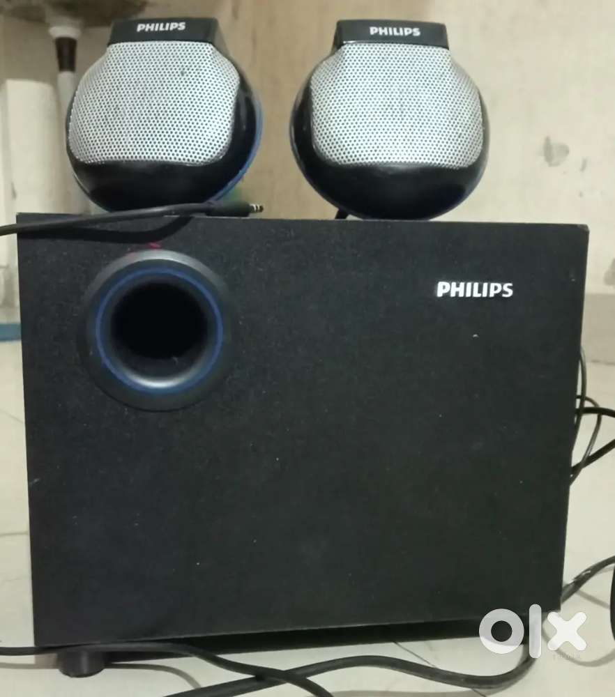 Philips 2.1 home theatre system & Nokia keypad mobile phone.