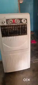 A Cooler with affordable price in good condition with  honey comb pad