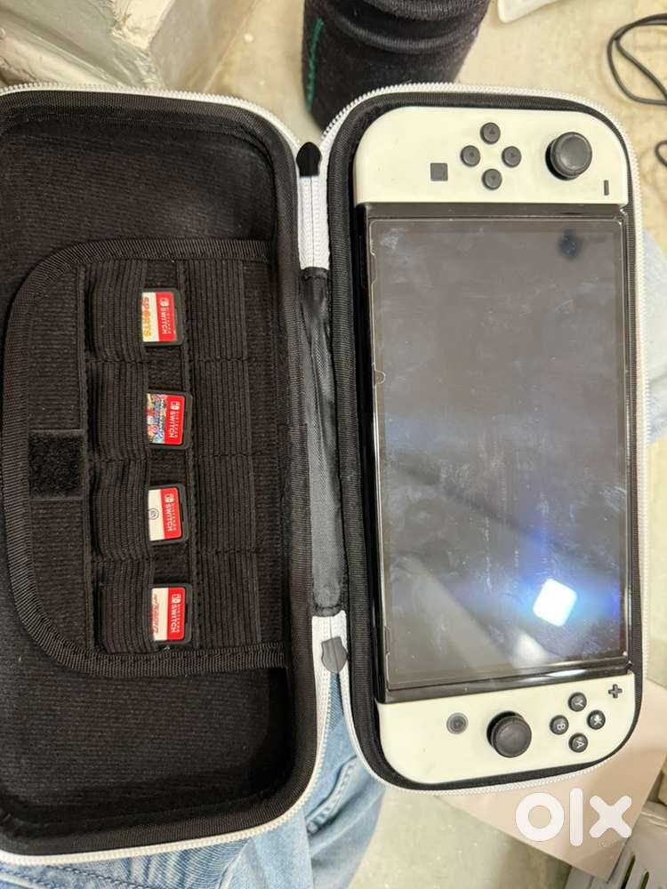 Nintendo swich oled with 4 game