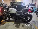 White dashing Himalayan bike