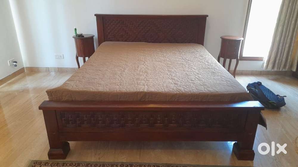 A heritage teak wood bed