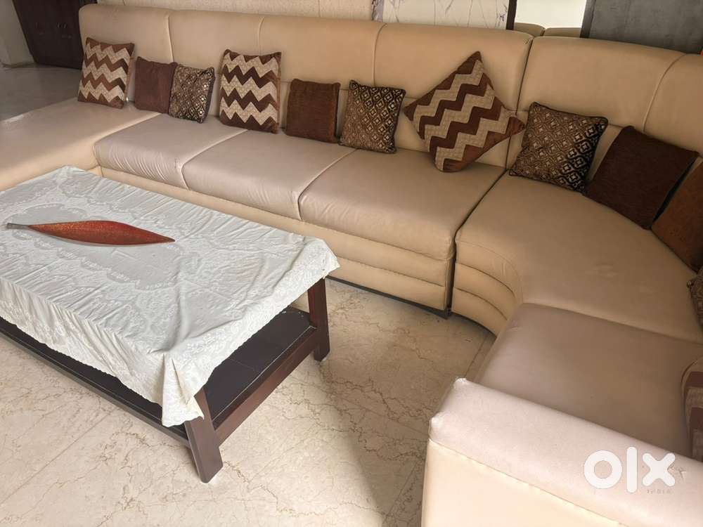 Sofa set including sal wood sofa and teak wood center table