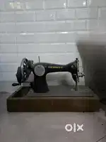 Machine for tailoring cloth items