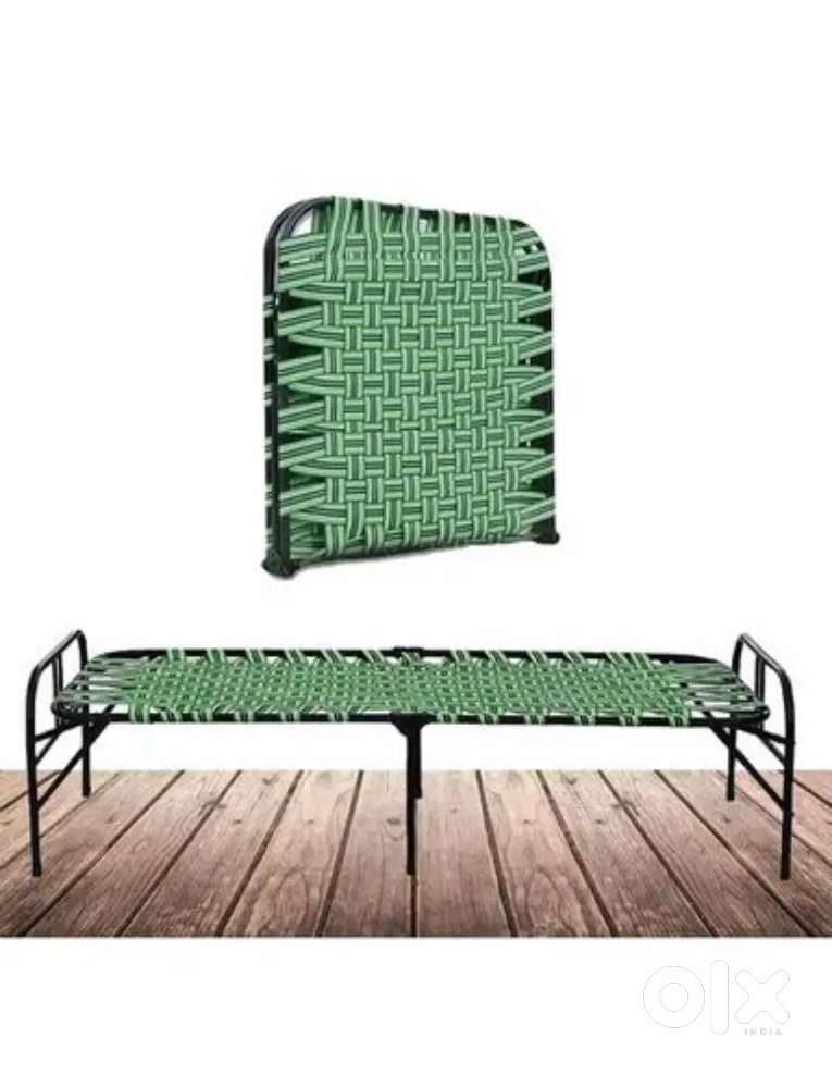 Charpai bed and plastic chair