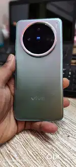 Vivo X200 12 256gb.    &.   Xiaomi 14  16 512 gb     & vivo x200 pro