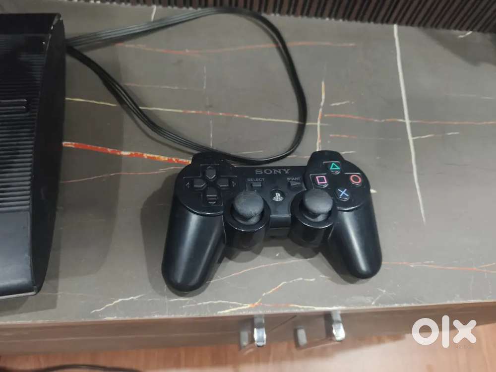 PlayStation 3 slim 12gb in very good condition with 2 controller