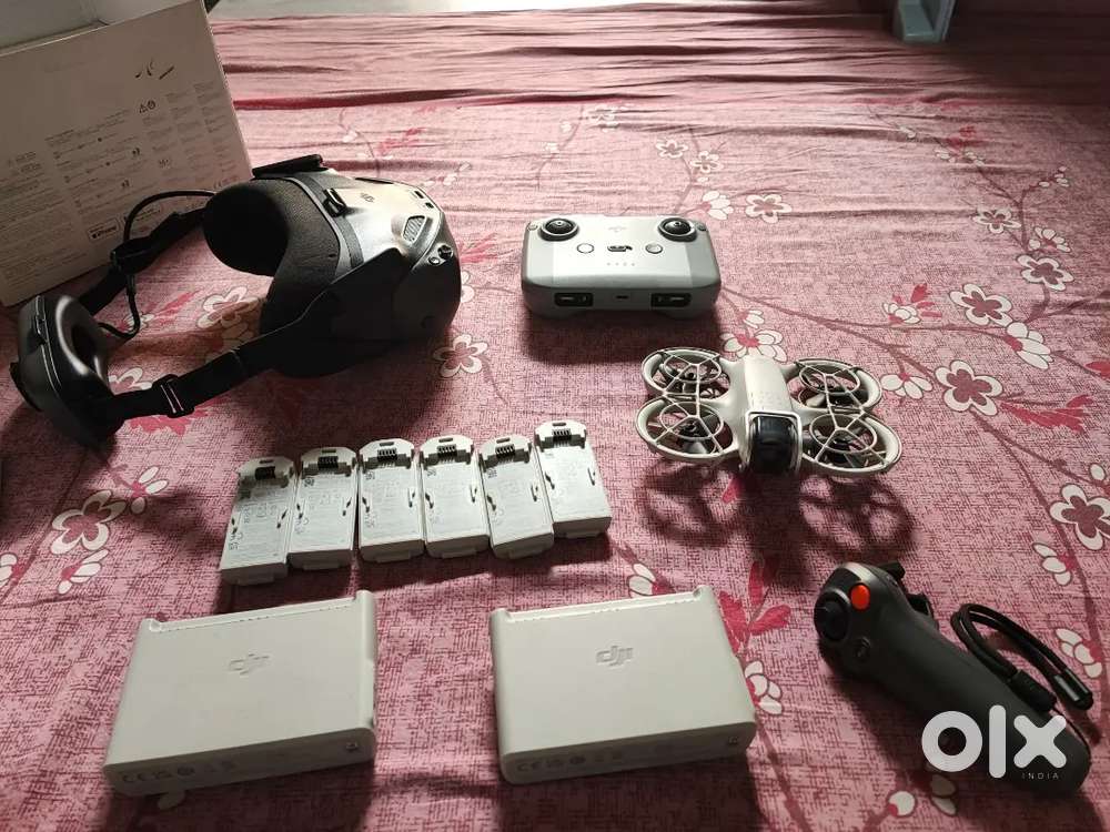 Dji Neo FPV Motion Fly with 6 batteries Goggles and remote