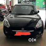 Swift Automatic. Black. Only 18,500 kms. Single owner.