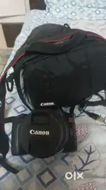 Canon  SL3 camera  very well  new  condition