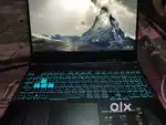 Asus tuf gaming laptop with mouse and keyboard