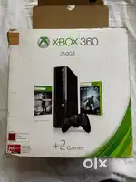 X box 360 gaming console with steering wheel