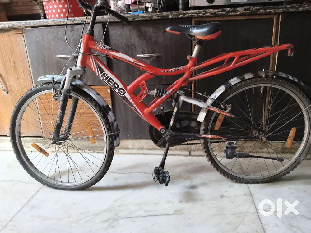 Red coloured hero's bicycle