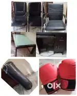 3 Chairs, 1 office glass table, 1 punching Bag