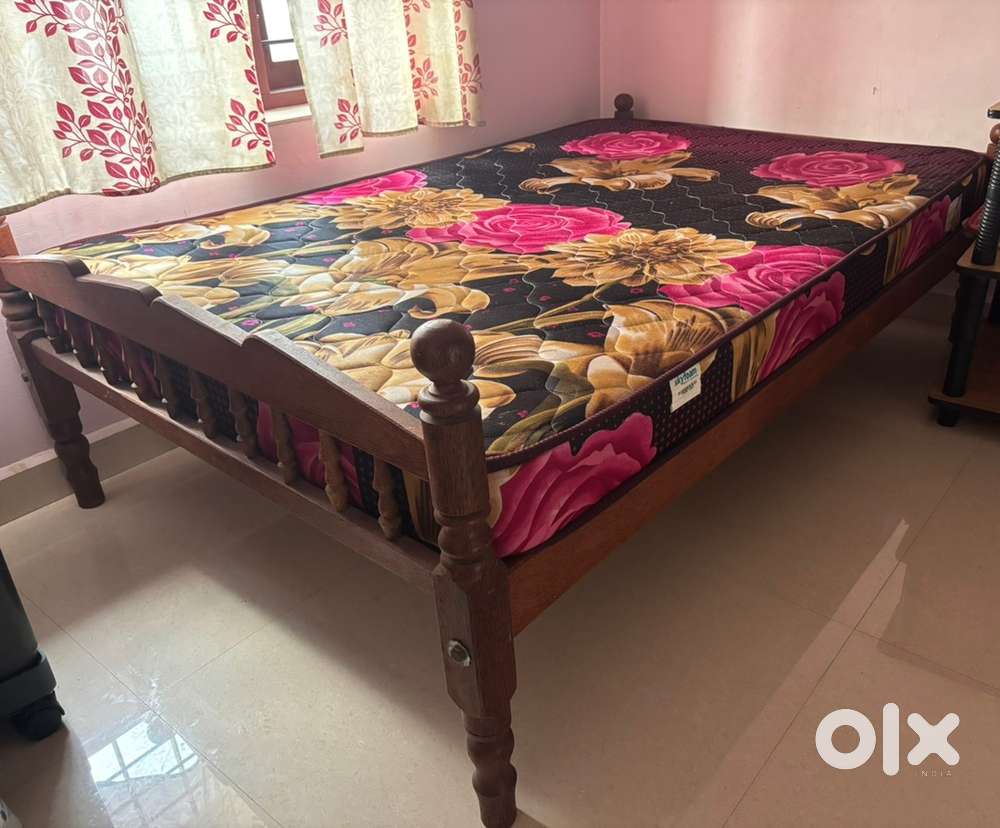 Double cot with bed