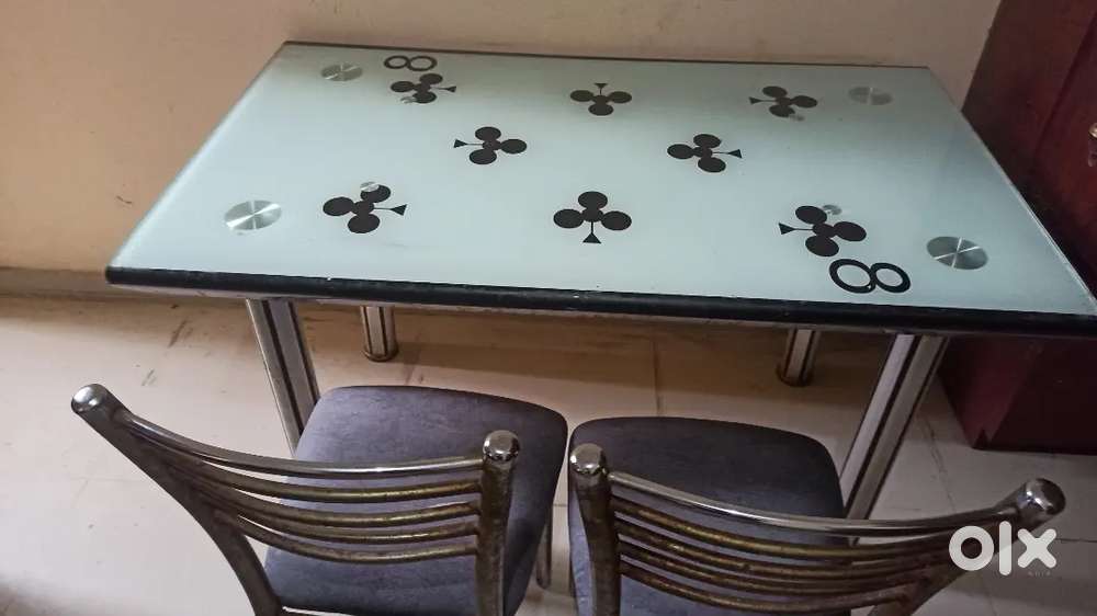 Four seater dining table with 4 chairs