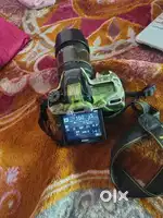 D7500 with 18-140 lens with charger and two battery