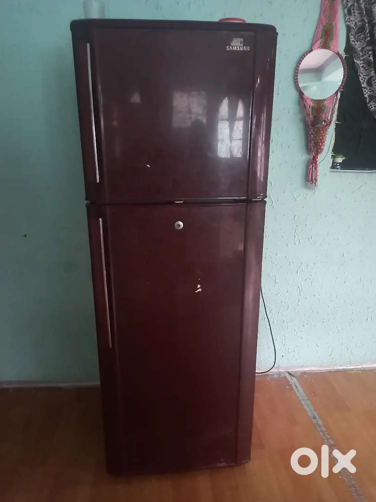 Dubble door fridge samsung two years old