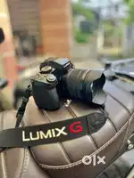 Lumix G85 Mirrorless with 12-60 mm lens