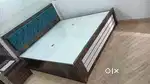 6x6 ft. bed with cushioned headboard